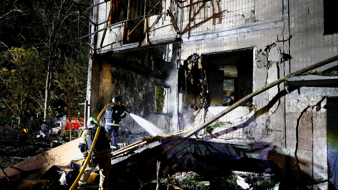Russia pounds Kyiv with missiles, killing at least nine 