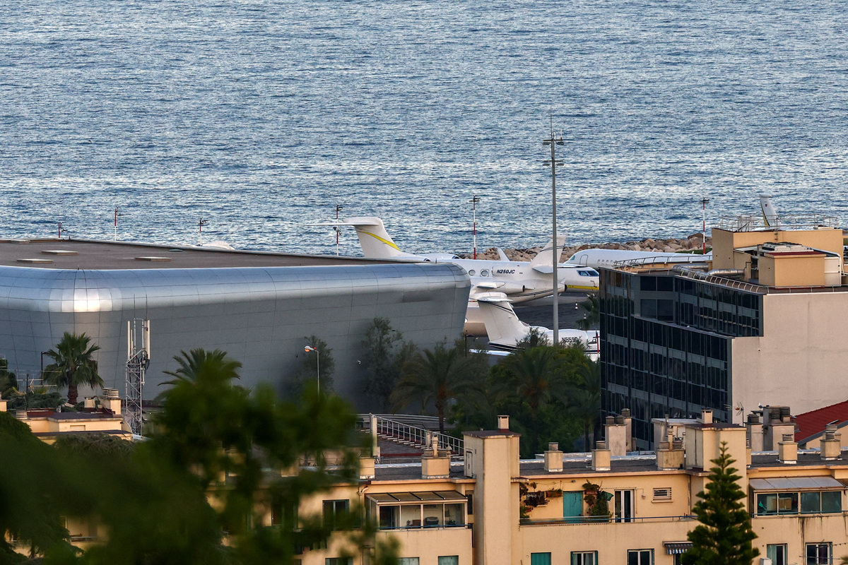 FILE PHOTO: Private jets are parked next to the hangar of Prince Albert II private plane, at the Nice Cote d'Azur international airport, the closest airport to Monaco during the Formula One weekend, in Nice, France, June 6, 2026. REUTERS/Manon Cruz/File Photo