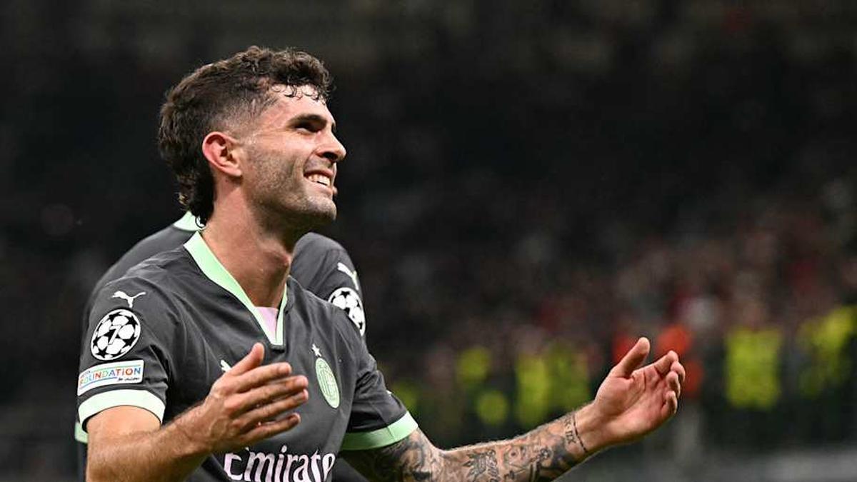  Pulisic has some Roman numerals on his wrist. | Gabriel Bouys/Getty Images 