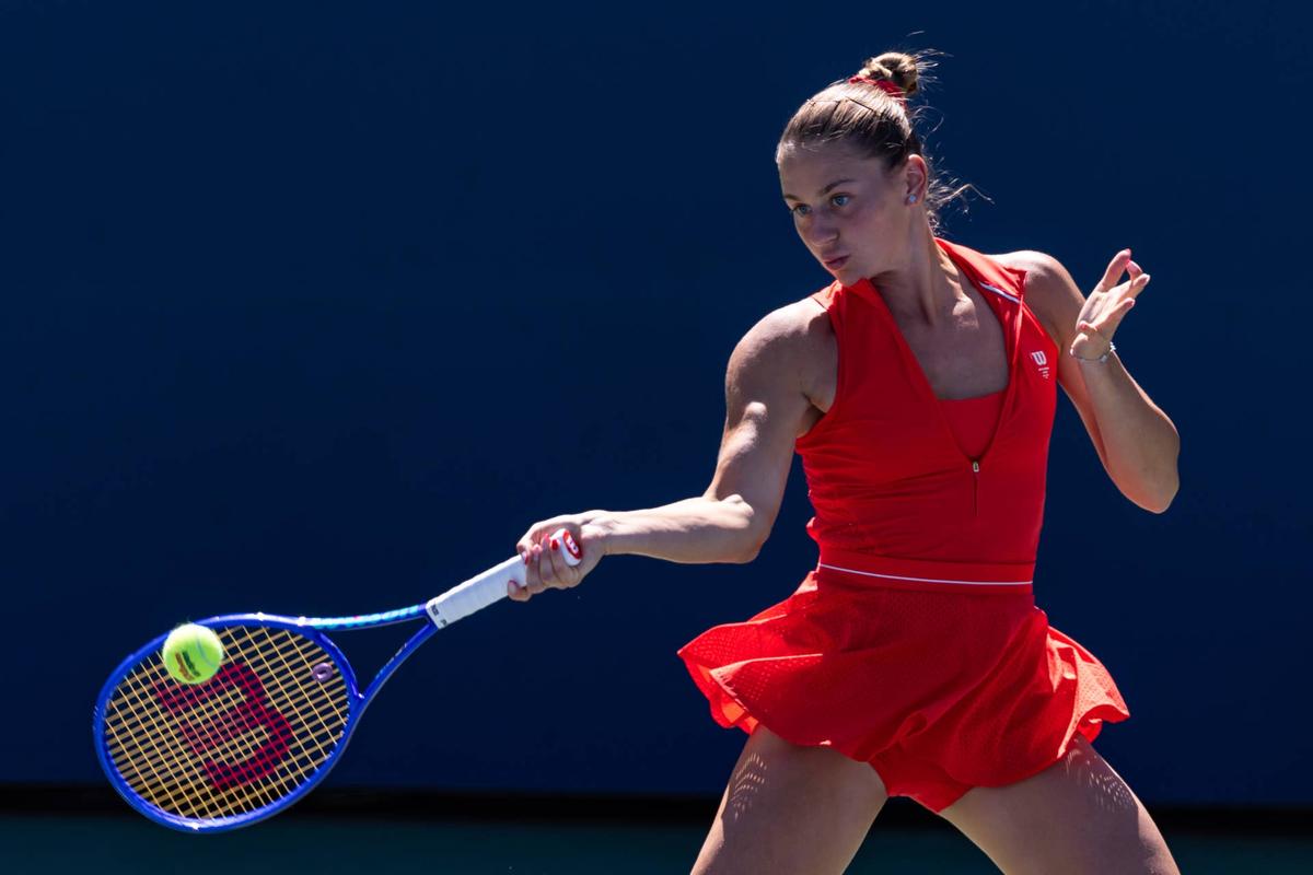  Aug 26, 2025; Flushing, NY, USA; Marta Kostyuk of Ukraine in action against Katie Boulter of United Kingdom in the first round of the women's singles at the US Open at Billie Jean King National Tennis Centre. Mandatory Credit: Mike Frey-Imagn Images 