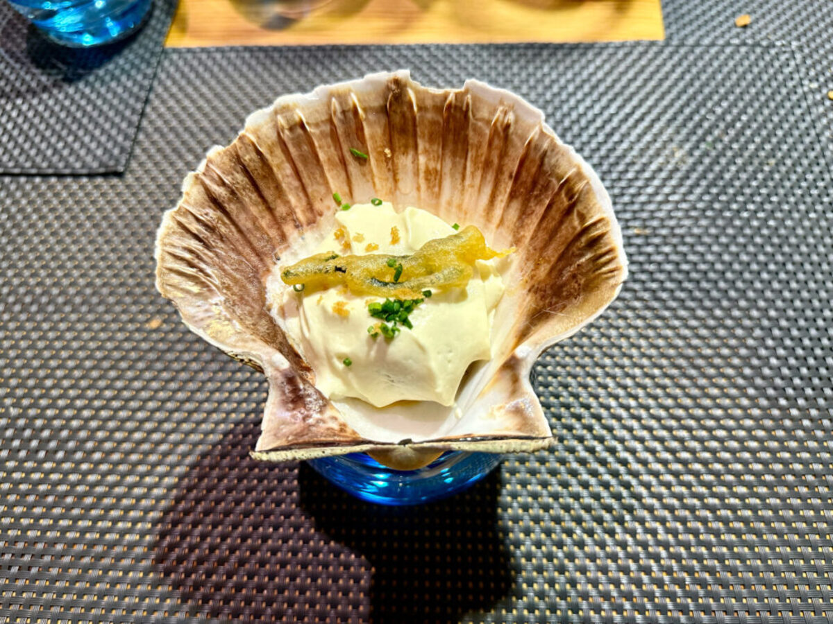  Vieira, Jamón y Ramallo de Mar” (Scallop, ham and seaweed) at the A Horta Do Obradoiro. The Ramallo de Mar is an edible wild seaweed, intensely green in color, with a spongy texture and a strong sea flavor. Photo credit: Margot Black 