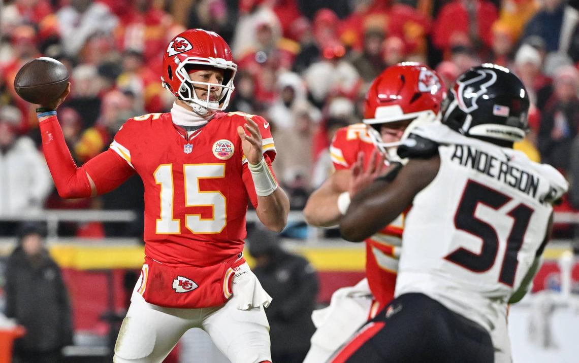  Dec 7, 2025; Kansas City, Missouri, USA; Kansas City Chiefs quarterback Patrick Mahomes (15) throws a pass as Houston Texans defensive end Will Anderson Jr. (51) rushes during the second quarter at GEHA Field at Arrowhead Stadium. Mandatory Credit: Amy Kontras-Imagn Images 