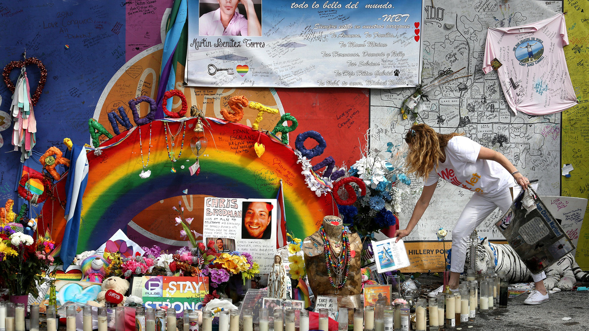 Pulse nightclub owner Barbara Poma tends to the memorial in front of her club Saturday, June 10, 2017, in Orlando, Florida. (Joe Burbank/Orlando Sentinel/TNS)