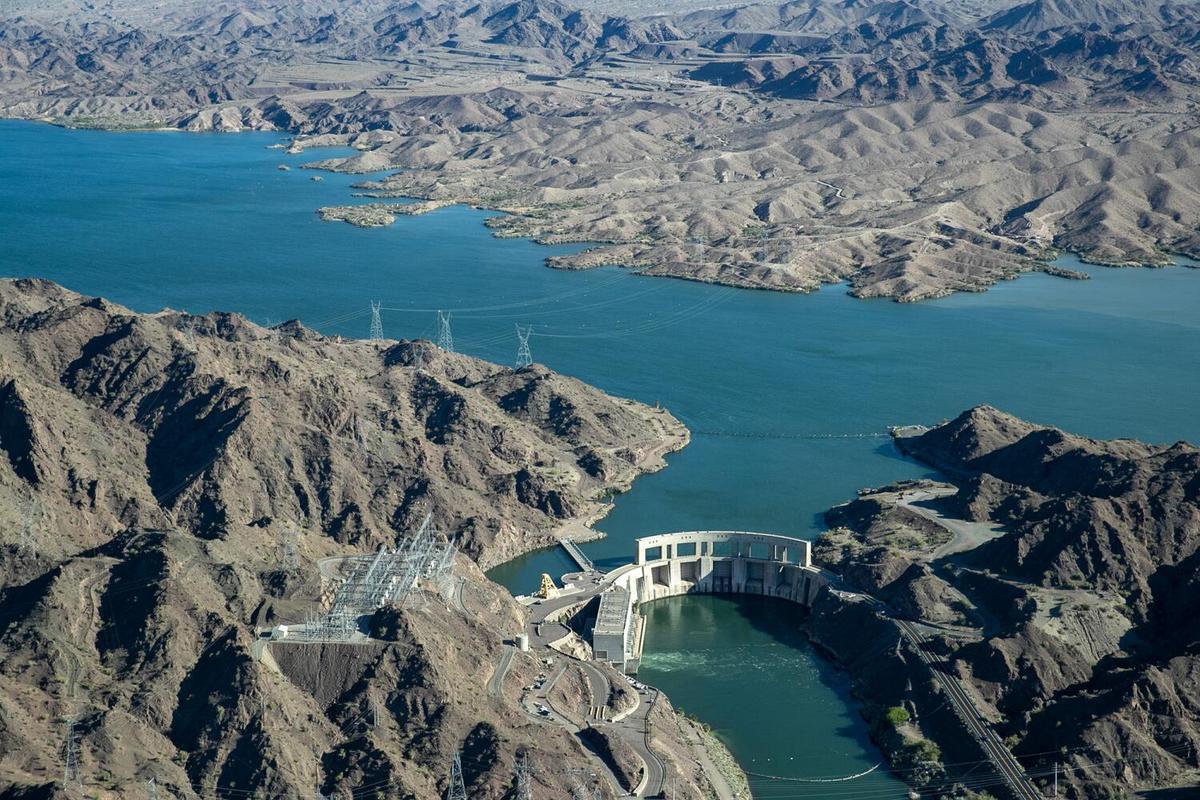 Parker Dam spans the Colorado River between Arizona and California and creates Lake Havasu on Tuesday, April 4, 2023 in Lake Havasu, CA. Parker Dam provides a reservoir from which water is pumped to the Colorado River Aqueduct. It is also the deepest dam in the world; 73 percent of its structural height of 320 feet is below the original riverbed. (Brian van der Brug / Los Angeles Times)