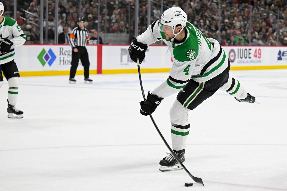  Dallas Stars defenseman Miro Heiskanen (4) shoots the puck against the Minnesota Wild. Nick Wosika-Imagn Images
