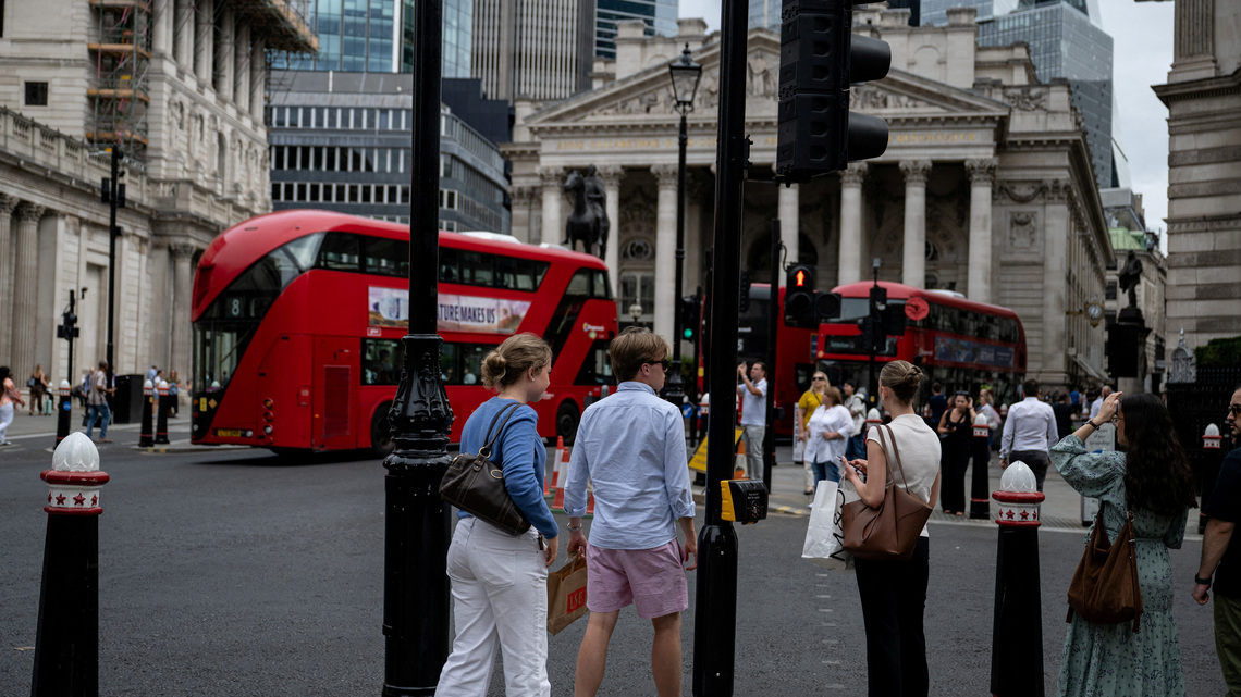 From Tokyo to London, heatwaves send men to work in shorts 