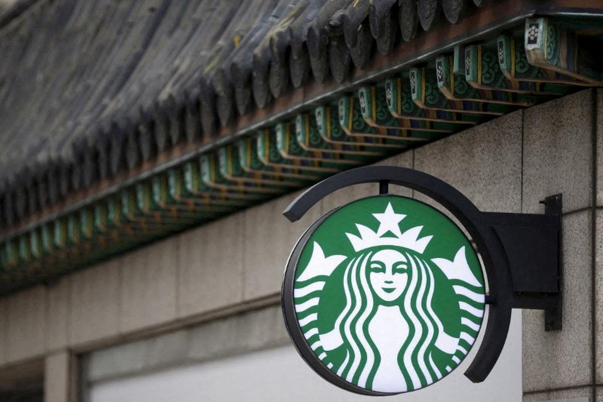 FILE PHOTO: A Starbucks logo is seen at a Starbucks coffee shop in Seoul, South Korea, March 7, 2016. Picture taken March 7, 2016. REUTERS/Kim Hong-Ji/File Photo
