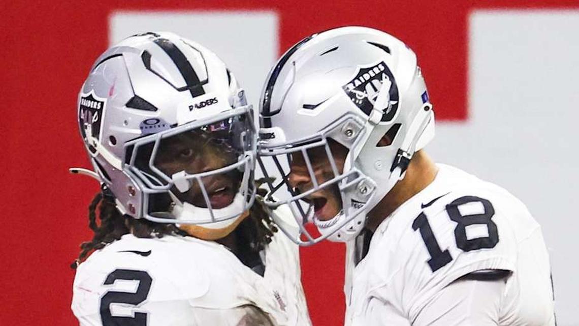  Dec 21, 2025; Houston, Texas, USA; Las Vegas Raiders running back Ashton Jeanty (2) celebrates with wide receiver Jack Bech (18) after catching a touchdown pass against the Houston Texans during the third quarter at NRG Stadium. Mandatory Credit: Thomas Shea-Imagn Images | Thomas Shea-Imagn Images 