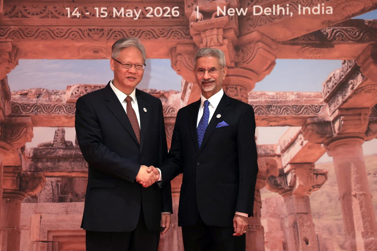 India's Foreign Minister Subrahmanyam Jaishankar shakes hands with China's Ambassador to India Xu Feihong during the BRICS foreign ministers' meeting at Bharat Mandapam in New Delhi, India May 14, 2026. REUTERS/Adnan Abidi