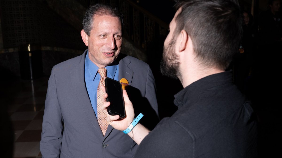 New York City Comptroller Brad Lander speaks to a member of the press during an election night rally for Assemblyman Zohran Mamdani on November 4 at the Brooklyn Paramount Theater in New York City. Lander, who is no longer comptroller, was acquitted of a charge related to his attempt to inspect an ICE facility. File Photo by Derek French/UPI