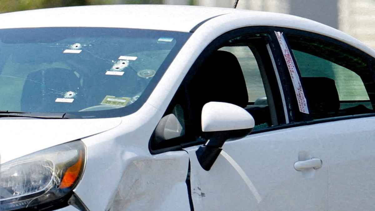 Vehicles involved in a shooting incident involving U.S. Immigration and Customs Enforcement (ICE) are towed from the scene in Biddeford, Maine, U.S., July 13, 2026. REUTERS/CJ Gunther