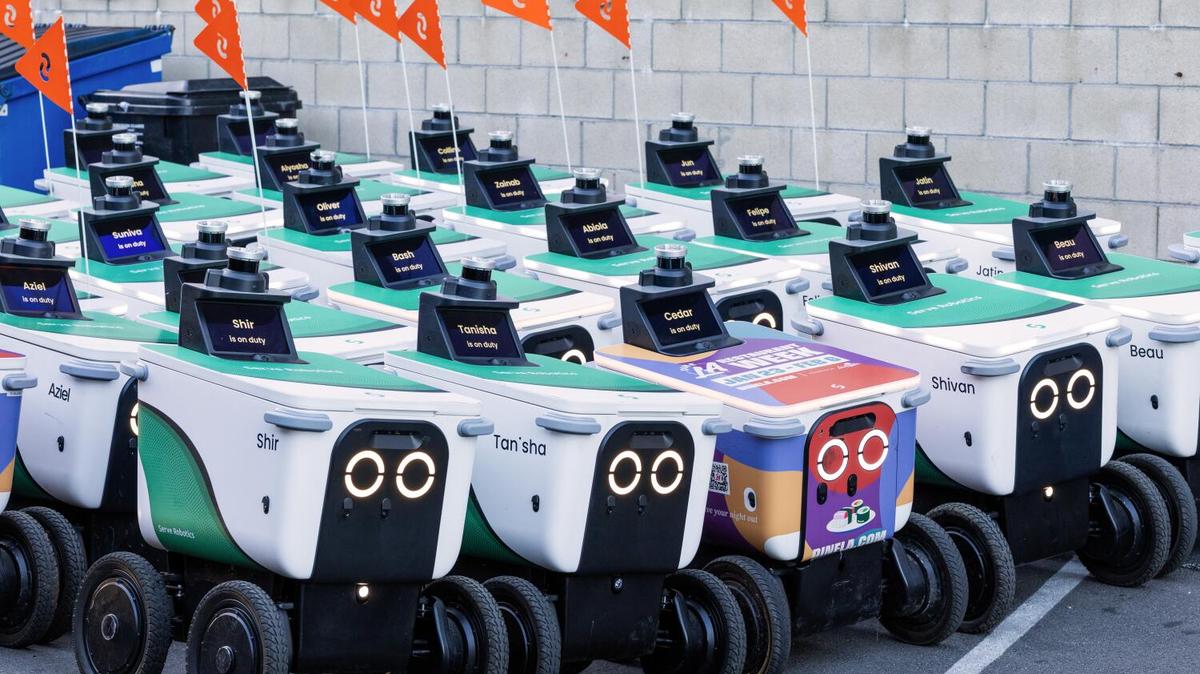 LOS ANGELES, CA - FEBRUARY 13: A fleet of Serve Robotics delivery robots wait to be transported in a delivery truck to their service areas on Friday morning, Feb. 13, 2026. For closer locations, the robots roll away from the company's Los Angeles depot. Farther service locations require them to be delivered by truck or van. Serve Robotics operates 2,000 delivery robots serving Los Angeles, Atlanta, Chicago, Miami and Dallas. (Myung J. Chun / Los Angeles Times)