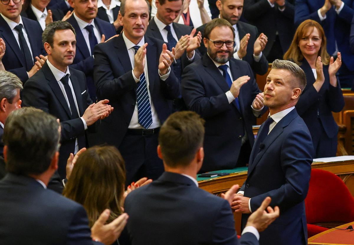 Peter Magyar receives a standing ovation as he becomes Hungary's new Prime Minister, at the Parliament in Budapest, Hungary, May 9, 2026. REUTERS/Bernadett Szabo