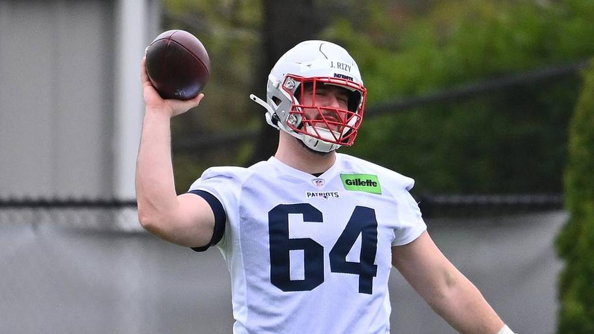  May 9, 2026; Foxborough, MA, USA; New England Patriots 2025-2026 offensive lineman Jacob Rizy (64) warms up with offensive lineman Nate Azzopardi (60) before the New England Patriots rookie camp at Gillette Stadium. Mandatory Credit: Eric Canha-Imagn Images | Eric Canha-Imagn Images 