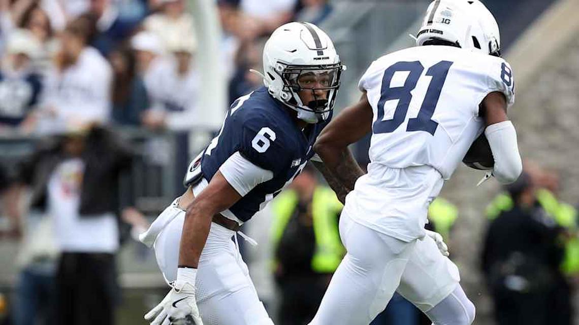  Apr 26, 2025; University Park, PA, USA; Penn State Nittany Lions safety Zakee Wheatley (6) attempts to tackle wide receiver Lyrick Samuel (81) during the first quarter of the Blue White spring game at Beaver Stadium. The White team defeated the Blue team 10-8. Mandatory Credit: Matthew O'Haren-Imagn Images | Matthew O'Haren-Imagn Images 