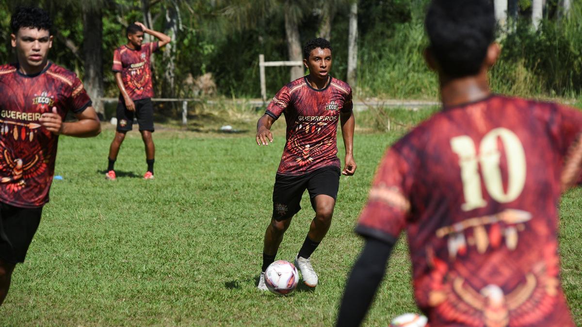 Players from Esporte Clube Originarios, a team composed entirely of Indigenous athletes, train ahead of a session in preparation for the Campeonato Carioca de Futebol - Serie C, in Marica, Rio de Janeiro, Brazil, April 30, 2026. REUTERS/Tita Barros