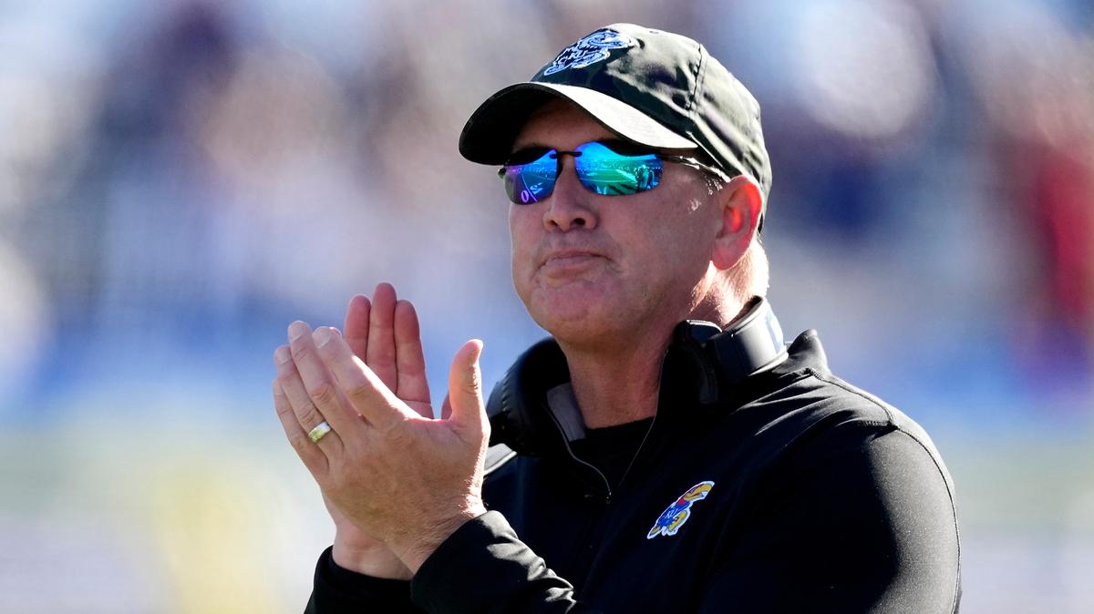 Kansas head coach Lance Leipold celebrates after a Kansas touchdown during the first half of an NCAA college football game against Oklahoma State Saturday, Nov. 5, 2022, in Lawrence, Kan. (AP Photo/Charlie Riedel)