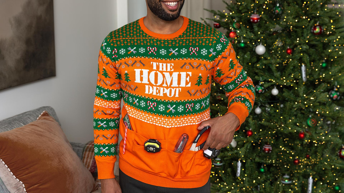 Home Depot unveils holiday sweater with fully equipped tool belt