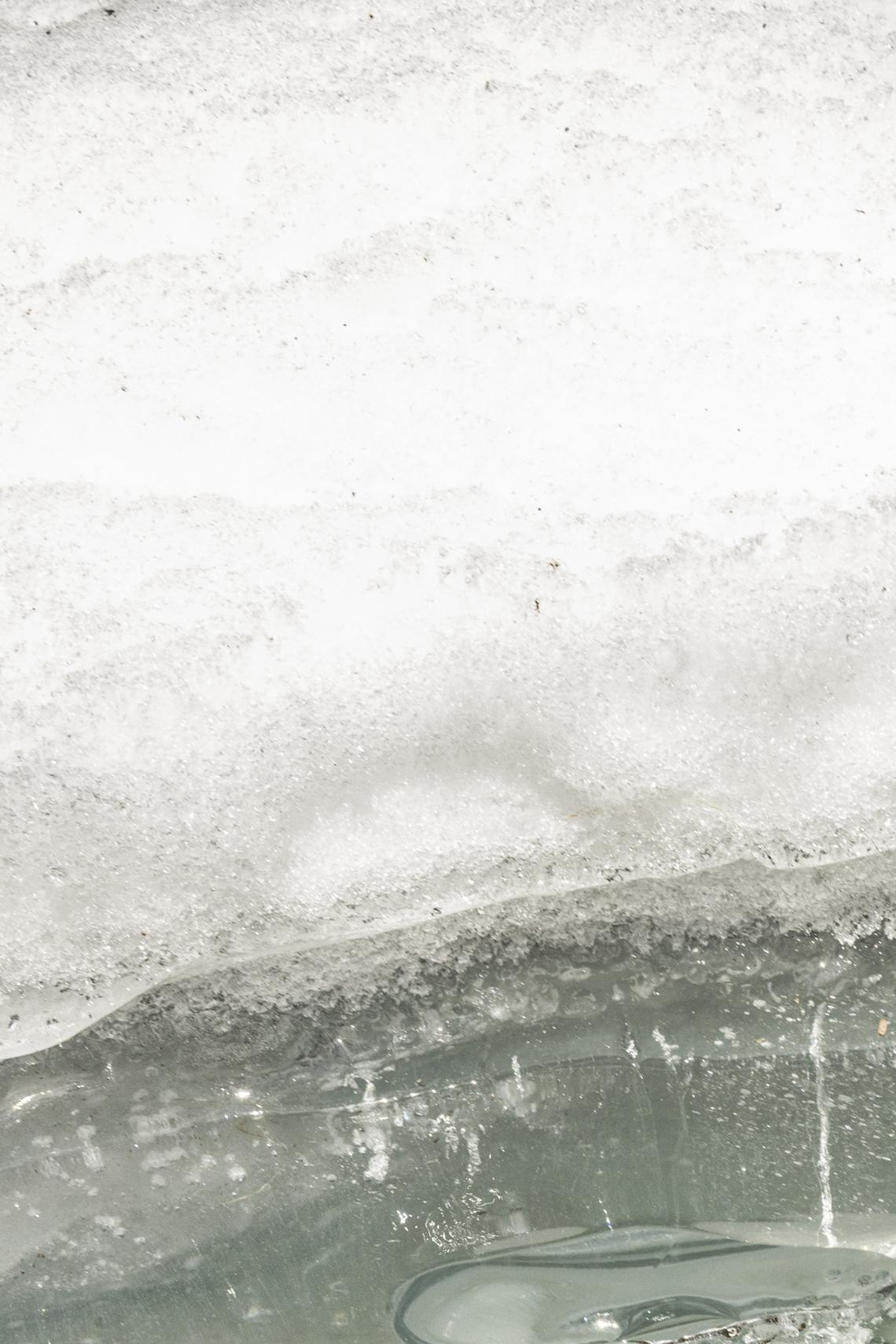 Melting ice on a Sandy River tributary in Farmington, Maine, March 3, 2026. The fragile hope for salmon recovery in Maine: a long-term project to remove or modify dams may clear the way for endangered wild Atlantic salmon to swim freely up to the Sandy River, but it faces opposition from business and lawmakers. (Greta Rybus/The New York Times)