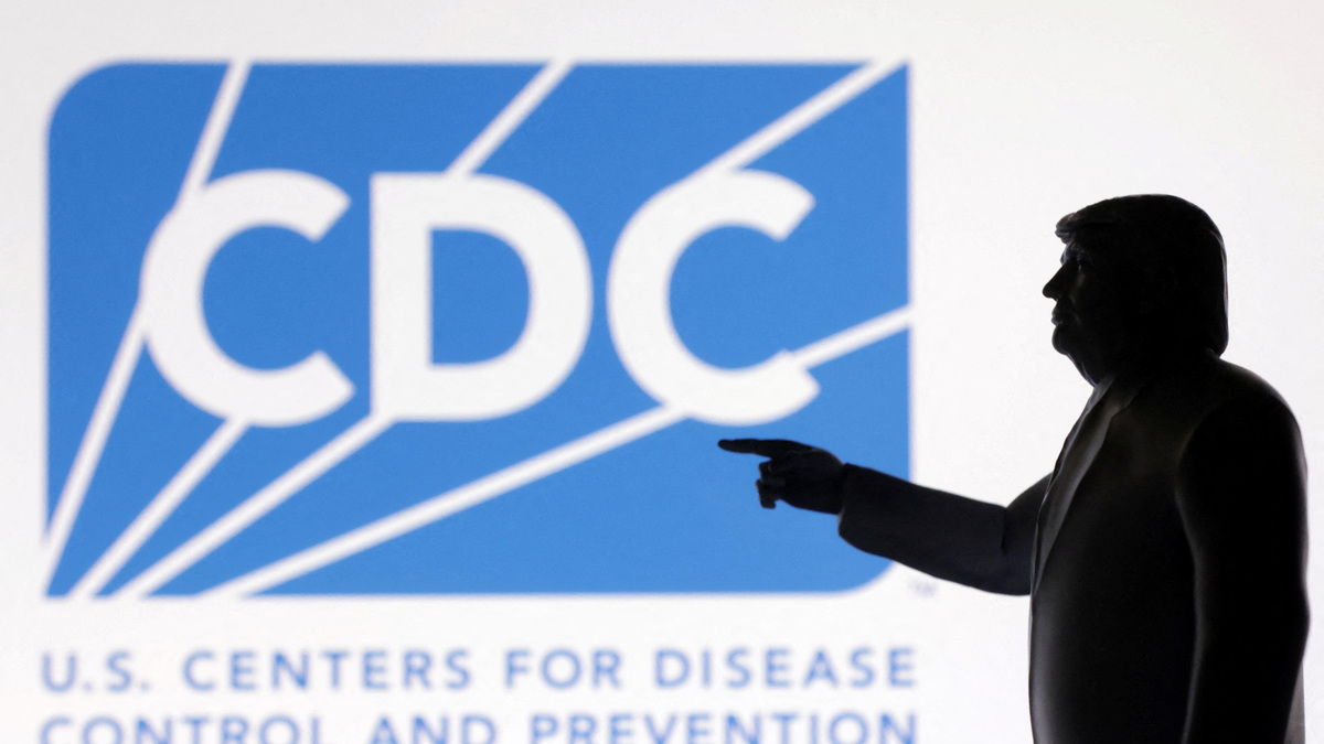 FILE PHOTO: A 3D-printed miniature model of U.S. President Donald Trump with the U.S. Centers for Disease Control (CDC) logo in the background is seen in this illustration taken April 23, 2025. REUTERS/Dado Ruvic/Illustration/ File Photo