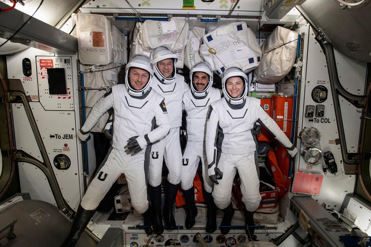 In this photo made available by NASA, four commercial crew astronauts, from left, European Space Agency astronaut Matthias Maurer and NASA astronauts Tom Marshburn, Raja Chari and Kayla Barron pose for a photo in their Dragon spacesuits during a fit check aboard the International Space Station’s Harmony module on April 21, 2022. SpaceX brought the four astronauts home with a splashdown in the Gulf of Mexico early Friday, May 6, capping the busiest month yet for Elon Musk’s taxi service.