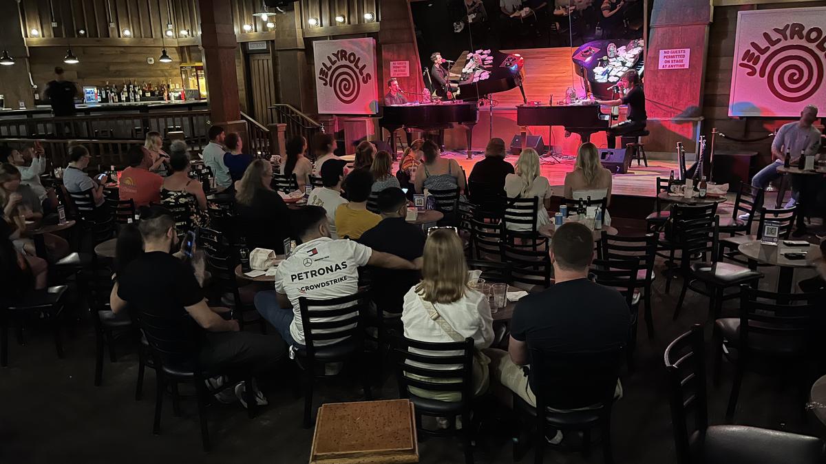 A late-night crowd listens to the pianists at Jellyrolls at Walt Disney World's Boardwalk on Tuesday, March 25, 2025. (Matthew J. Palm/Orlando Sentinel/TNS)