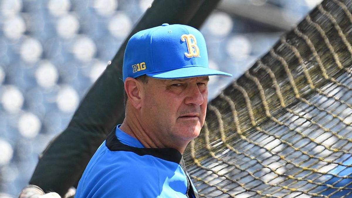  Jun 14, 2025; Omaha, Neb, USA; UCLA Bruins head coach John Savage watches the team warm up before the game against the Murray State Races at Charles Schwab Field. Mandatory Credit: Steven Branscombe-Imagn Images | Steven Branscombe-Imagn Images 