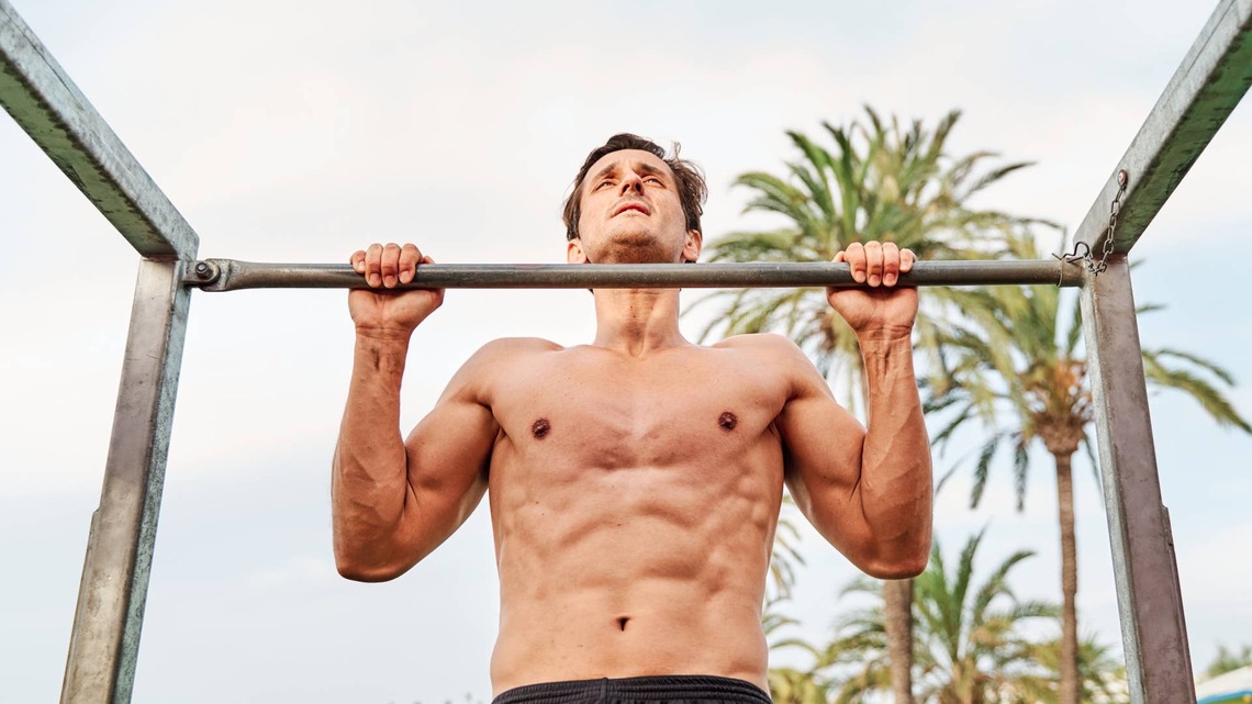 The Bodyweight Workout That Gets You to 15 Pull Ups and 25 Dips 