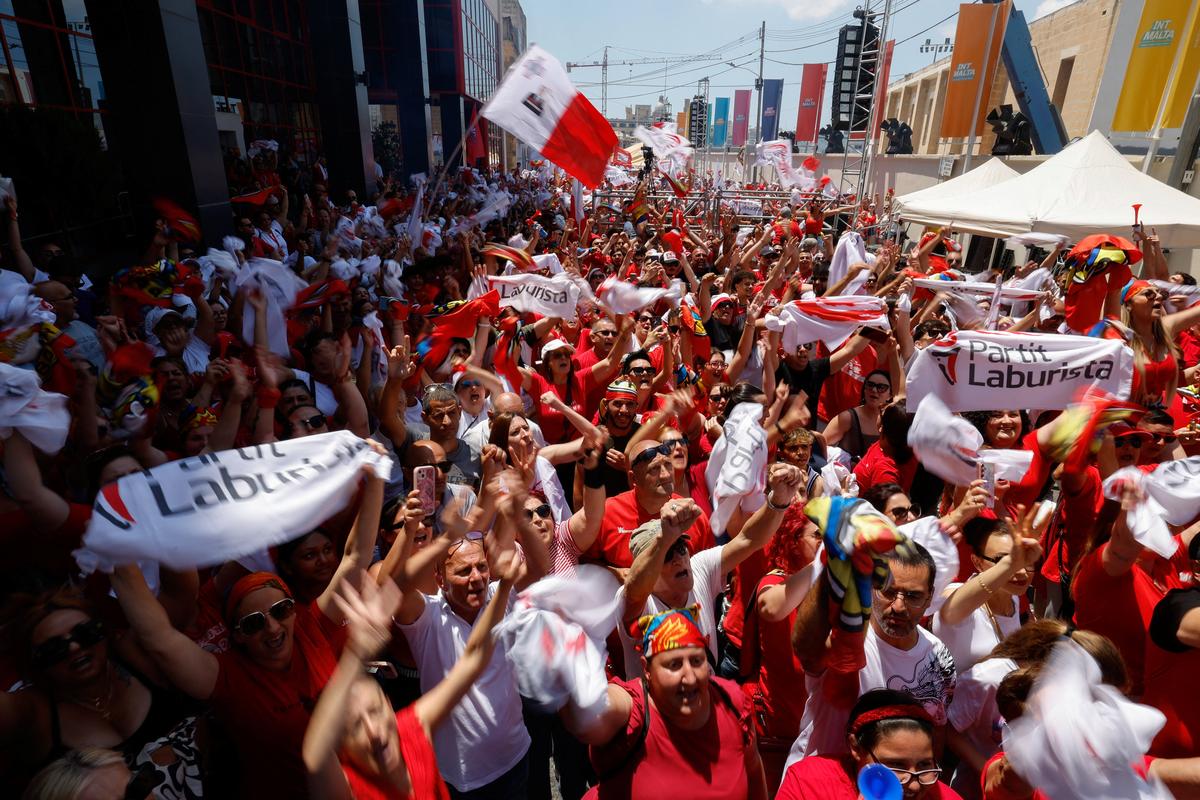 Supporters of Malta's Labour Party celebrate as the party has won the general election, outside the party headquarters in Hamrun, Malta May 31, 2026.  REUTERS/Darrin Zammit Lupi