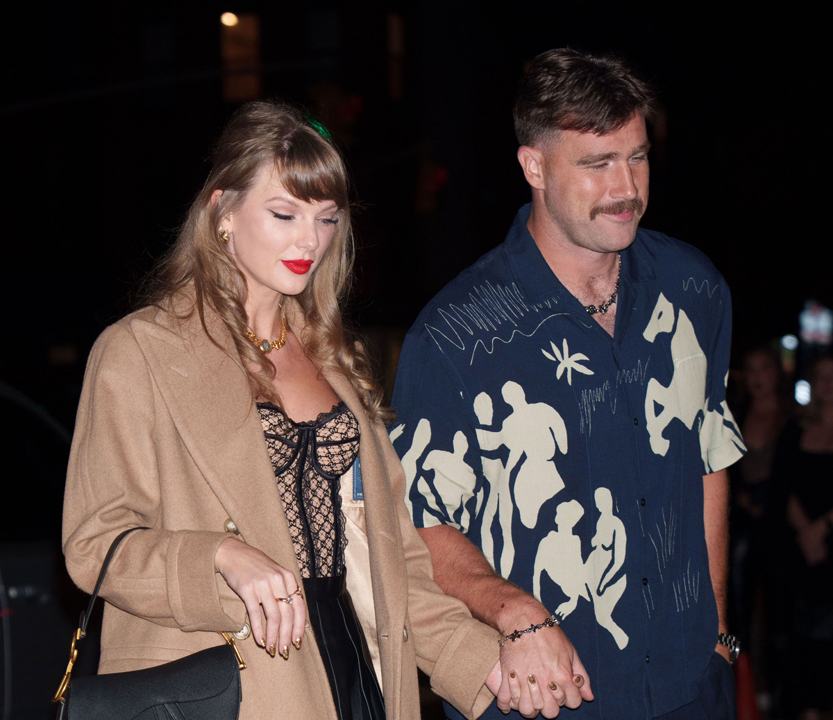 Taylor Swift in Dior with Travis Kelce in New York City, 2024Getty