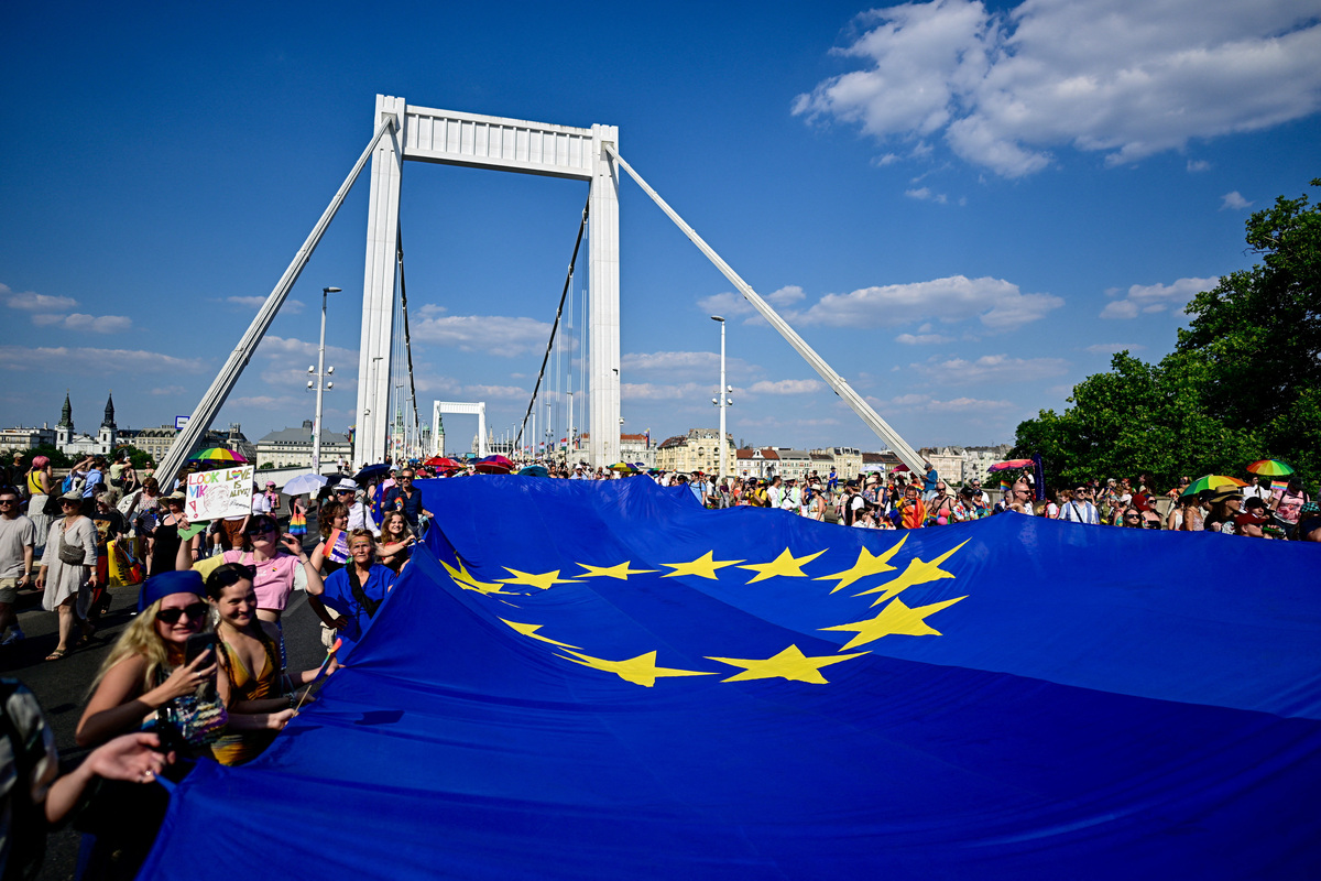 People carry a giant EU flag as they attend the Budapest Pride March in Budapest, Hungary, June 27, 2026. REUTERS/Marton Monus