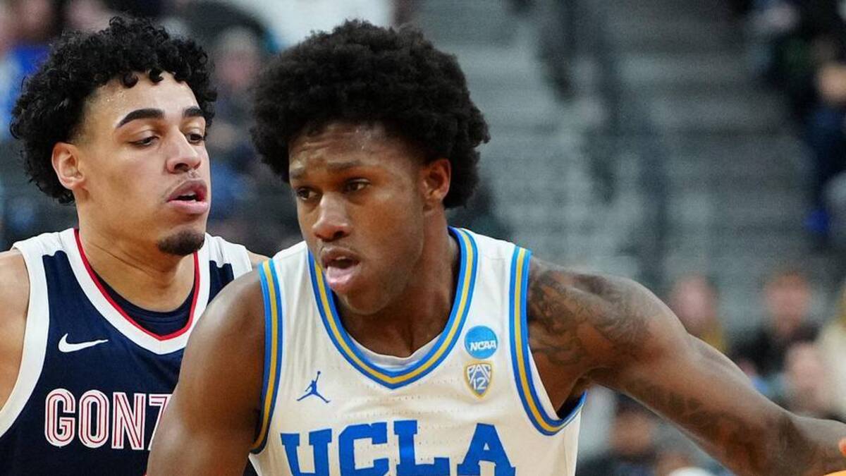  Mar 23, 2023; Las Vegas, NV, USA; UCLA Bruins guard David Singleton (34) dribbles the ball against Gonzaga Bulldogs guard Julian Strawther (0) during the first half at T-Mobile Arena. Mandatory Credit: Stephen R. Sylvanie-Imagn Images | Stephen R. Sylvanie-Imagn Images 