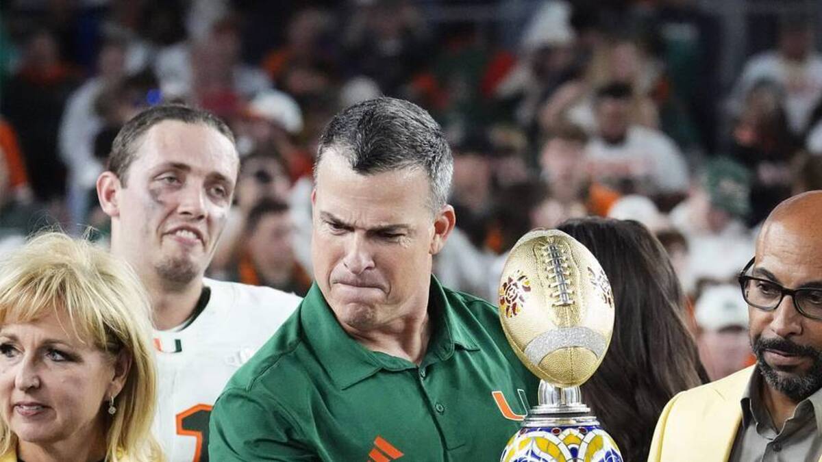  Miami Hurricanes head coach Mario Cristobal pumps his fist after defeating Ole Miss 31-27 in the Vrbo Fiesta Bowl and CFP semifinal game at State Farm Stadium on Jan. 8, 2026, in Glendale. | Rob Schumacher/The Republic / USA TODAY NETWORK via Imagn Images 