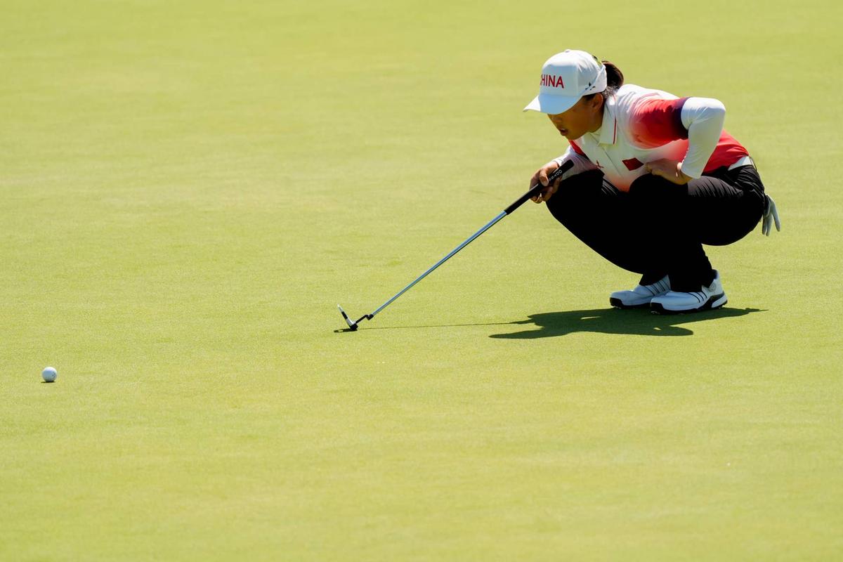  Ruoning Yin (China) on no. 6 in the final round of women's individual stroke play during the Paris 2024 Olympic Summer Games at Le Golf National. Katie Goodale-USA TODAY Sports