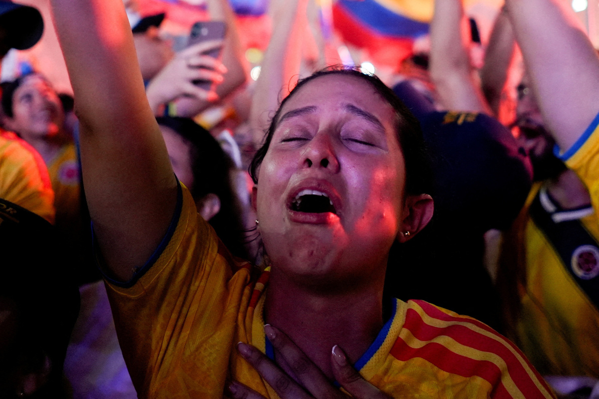 A supporter of Colombia's right-wing presidential candidate Abelardo De La Espriella reacts after the preliminary runoff results against leftist candidate Ivan Cepeda, in Barranquilla, Colombia, June 21, 2026. REUTERS/Charlie Cordero