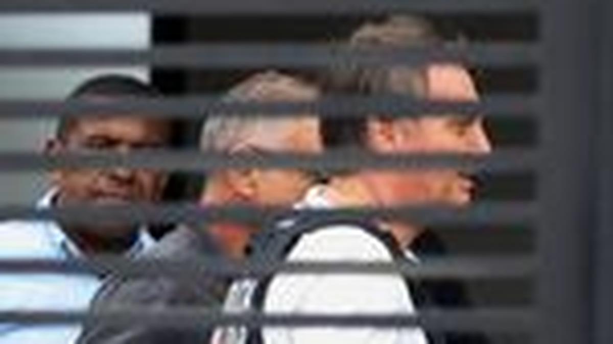 FILE PHOTO: Former Brazilian President Jair Bolsonaro arrives home to begin serving house arrest following authorization by Supreme Court Justice Alexandre de Moraes, after Bolsonaro was convicted by a Supreme Court majority of plotting a coup to remain in power after losing the 2022 election, in Brasilia, Brazil March 27, 2026. REUTERS/Adriano Machado /File Photo