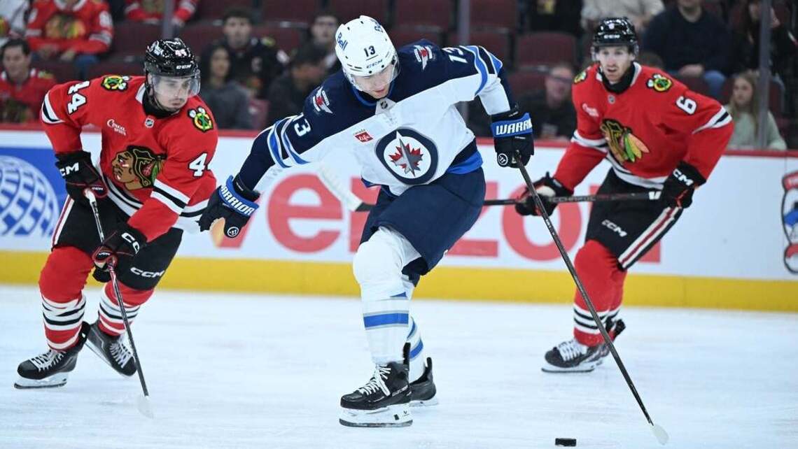 Blackhawks emerge with overtime win despite Jets' comeback 