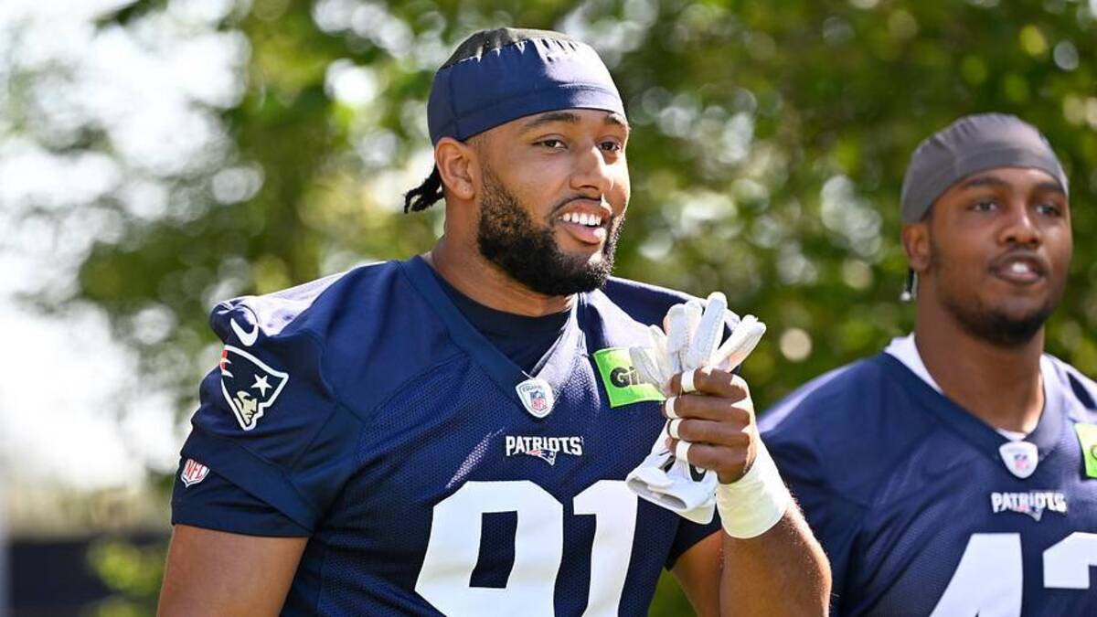  Jul 23, 2025; Foxborough, MA, USA; New England Patriots edge Elijah Ponder (91) walks to the practice field for training camp at Gillette Stadium. Mandatory Credit: Eric Canha-Imagn Images | Eric Canha-Imagn Images 