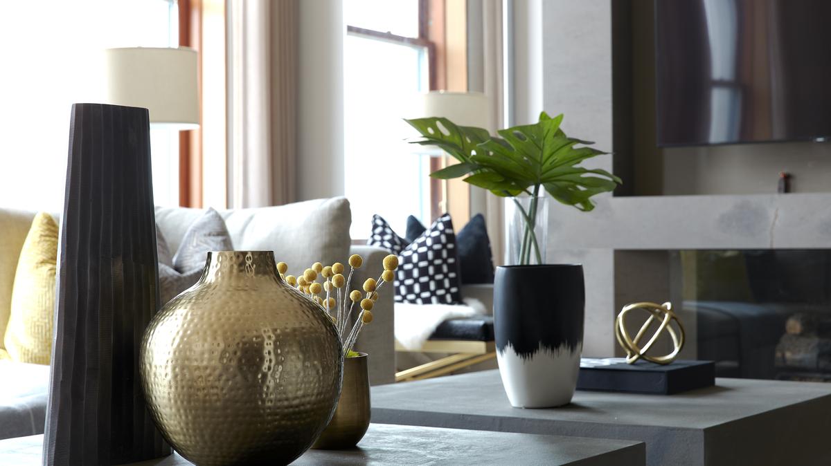 A series of vignettes in three’s is used to adorn coffee tables in this living space. (Scott Gabriel Morris/TNS)