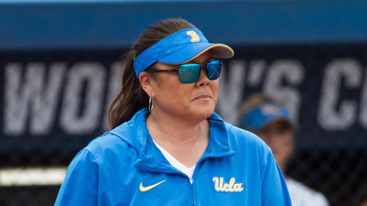  May 30, 2024; Oklahoma City, OK, USA; UCLA Bruins head coach Kelly Inouye-Perez walks to the pitcher's mound in the fifth inning against the Alabama Crimson Tide during a Women's College World Series softball game at Devon Park. Mandatory Credit: Brett Rojo-Imagn Images | Brett Rojo-Imagn Images 