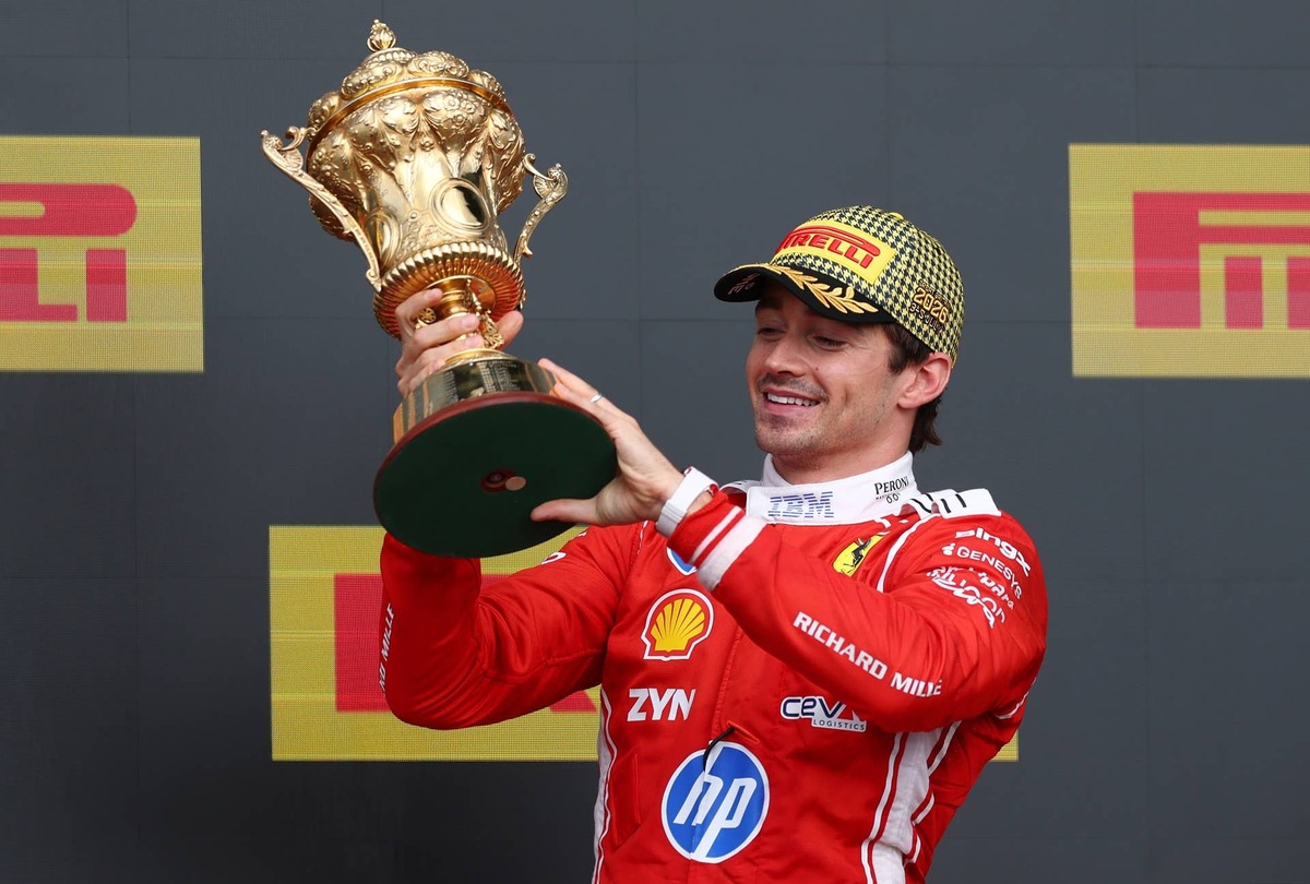  Charles Leclerc lifts his trophy on the podium after winning the 2026 F1 Grand Prix of Great Britain at Silverstone Circuit. Photo by Clive Rose/Getty Images