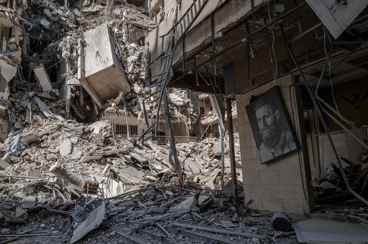 A destroyed barbershop amid buildings destroyed in recent Israeli strikes in Tyre, Lebanon, May 29, 2026. (Daniel Berehulak/The New York Times)