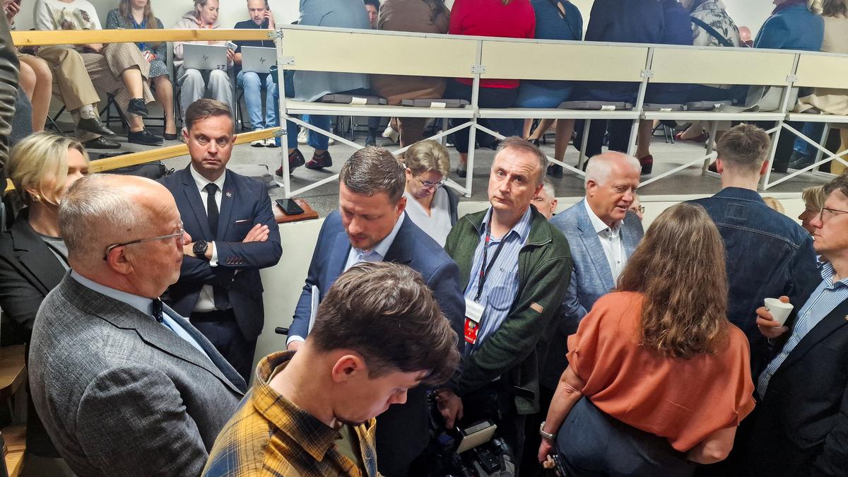 FILE PHOTO: People gather inside a shelter at the Lithuanian parliament after an 'air danger' warning, in Vilnius, Lithuania, May 20, 2026. REUTERS/Andrius Sytas/File Photo