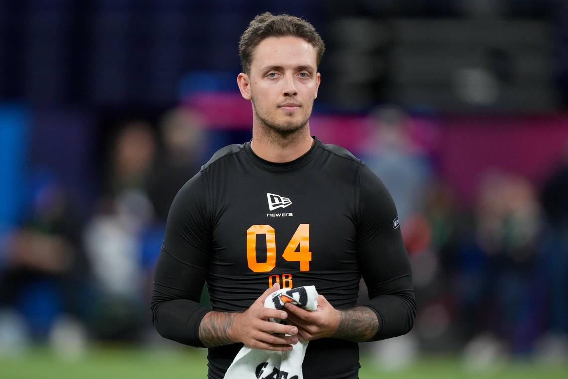  Feb 28, 2026; Indianapolis, IN, USA; Miami quarterback Carson Beck (QB04) during the NFL Scouting Combine at Lucas Oil Stadium. Mandatory Credit: Kirby Lee-Imagn Images 