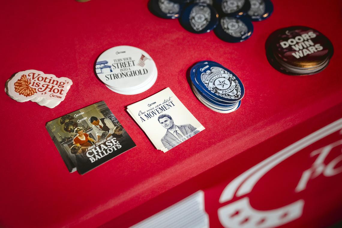 FILE -- Stickers promoting Turning Point U.S.A., the organization founded by Charlie Kirk, at a forum for Republican candidates in Georgia's 14th Congressional District on Feb. 12, 2026, in Dalton, Ga. Turning Point officials acknowledge that their influence over the youth vote has become more tenuous this year. (Nicole Craine/The New York Times)