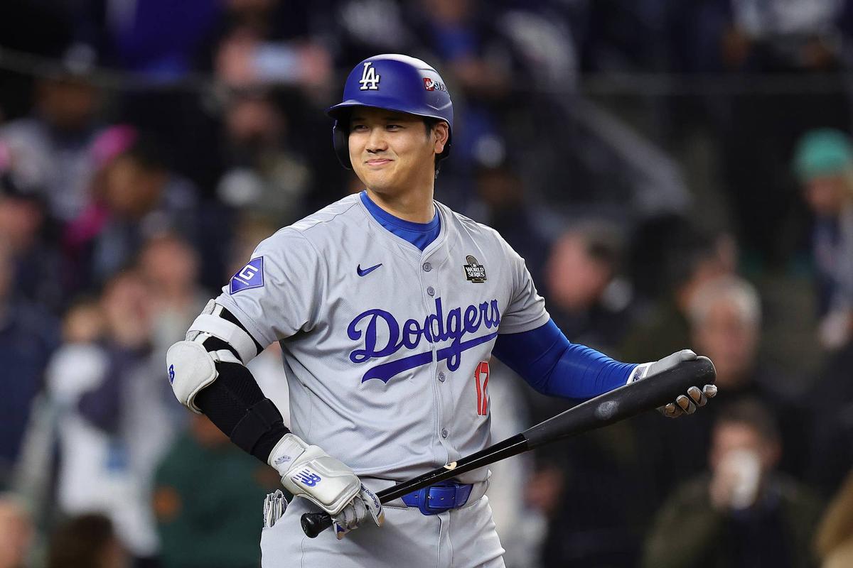  NEW YORK, NEW YORK - OCTOBER 28: Shohei Ohtani #17 of the Los Angeles Dodgers reacts after being walked in the first inning against the New York Yankees during Game Three of the 2024 World Series at Yankee Stadium on October 28, 2024 in the Bronx borough of New York City. (Photo by Alex Slitz/Getty Images) 