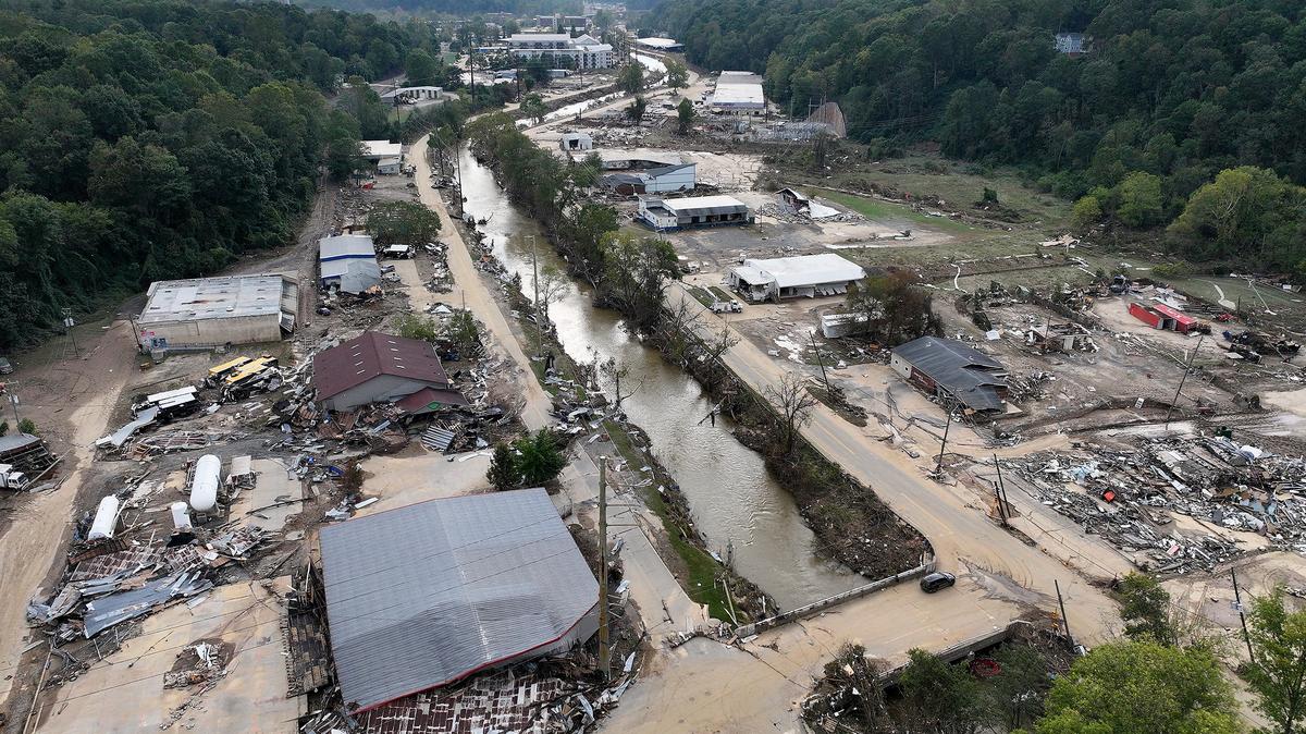 In an aerial view, flood damage wrought by Hurricane Helene is seen along the Swannanoa River on Oct. 3, 2024, in Asheville, North Carolina. (Mario Tama/Getty Images/TNS)