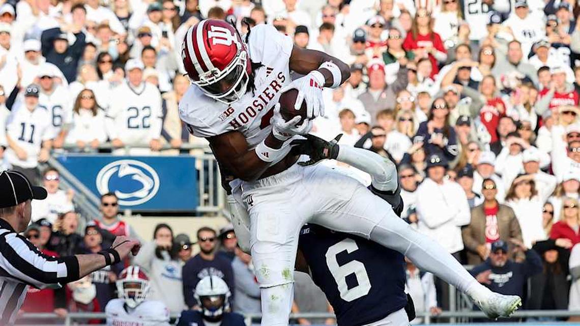  Nov 8, 2025; University Park, Pennsylvania, USA; Indiana Hoosiers wide receiver Omar Cooper Jr. (3) makes a catch in the end zone for a touchdown during the fourth quarter against the Penn State Nittany Lions at Beaver Stadium. Mandatory Credit: Matthew O'Haren-Imagn Images | Matthew O'Haren-Imagn Images 