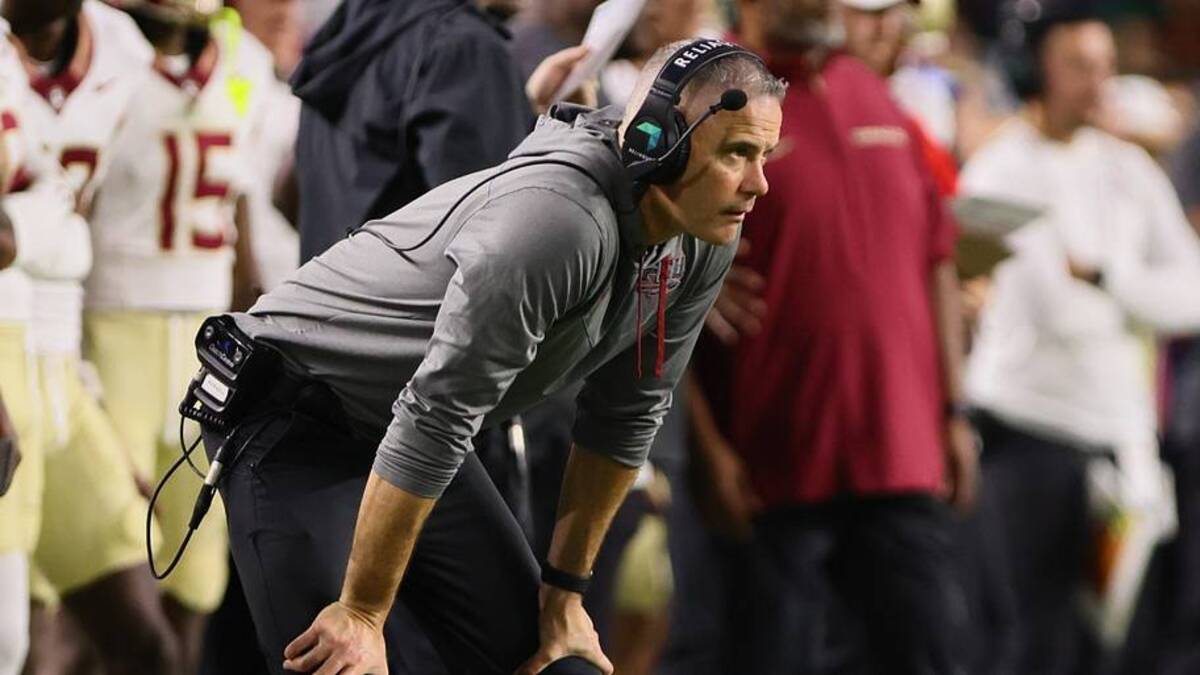  Oct 26, 2024; Miami Gardens, Florida, USA; Florida State Seminoles head coach Mike Norvell watches from the sideline against the Miami Hurricanes during the second quarter at Hard Rock Stadium. Mandatory Credit: Sam Navarro-Imagn Images | USA TODAY Sports via Reuters Connect 