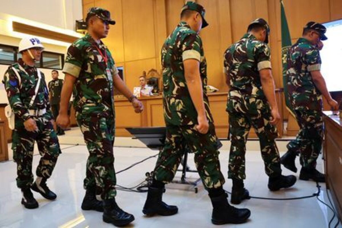 Indonesian military personnel Sami Lakka, Nandala Dwi Prasetya, Budhi Hariyanto Widhi Cahyono, and Edi Sudarko, leave the court room after they were found guilty on charges of serious premeditated assault in an acid attack on an activist known for campaigning against the growing role of the military Andrie Yunus, a ‌deputy coordinator with the Commission for Missing Persons and Victims of Violence, (KontraS), following their verdicts at the military court in Jakarta, Indonesia, June 10, 2026. REUTERS/Willy Kurniawan
